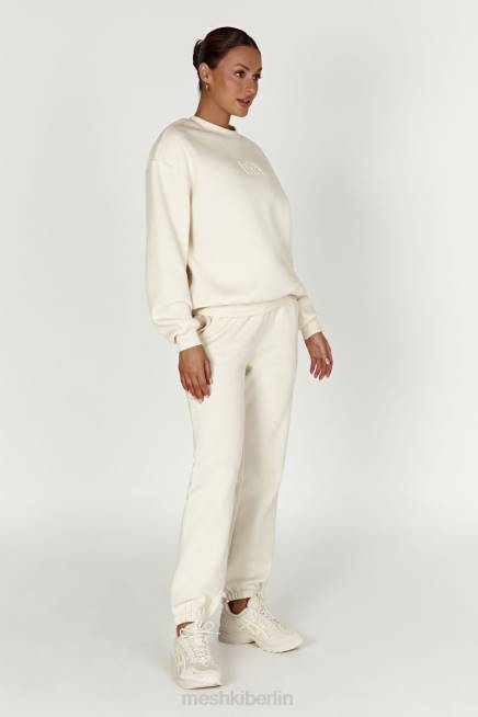 Kleidung Meshki Jogginghose aus Fleece mit Schmirgelprägung Knochen 2F8B1480